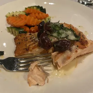 I chose today's special: Greek style salmon. I had choices of sides, and I chose steamed vegetables and a salad .