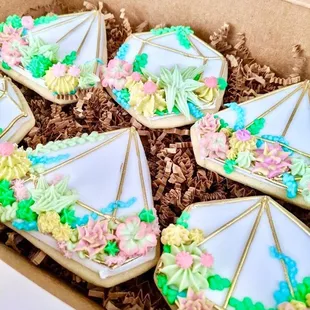 a box of decorated cookies