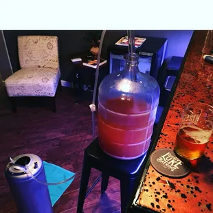 Transferring from secondary into a keg. All products from the bearded Brewer.