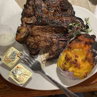 Porterhouse 1 1/2 lb Waygu Steak with a loaded baked potato. YES. DELICIOUS.
