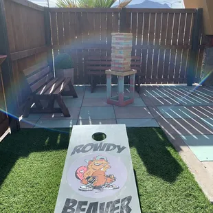 CORN HOLE AND JENGA PN THE PATIO