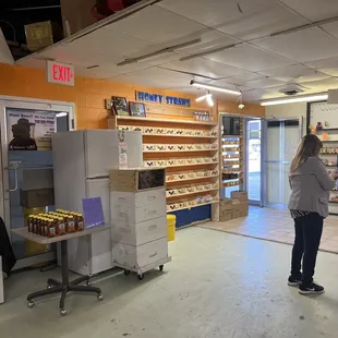 a man and a woman standing in a store