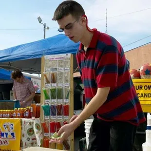 a man cutting up a piece of wood