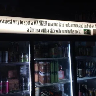 a display of beer in a cooler