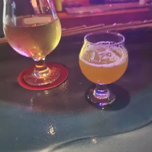 a glass of beer and a glass of beer