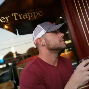 a man holding a glass