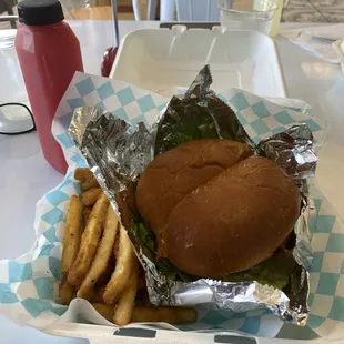 TOASTED BRIOCHE BUN + UNBEETABLE CHICKEN + PICKLES + TOMATOES + ONION + KANEZ SAUCE and Watermelon and Cucumber Juice