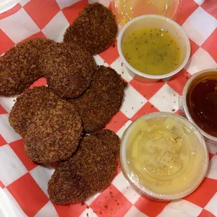 chickless bites with lemon pepper sauce, sweet chili, &amp; garlic parm