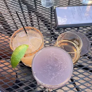 two cocktails on a table