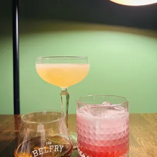 two cocktails on a table