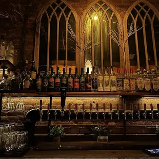 a bar with bottles of alcohol