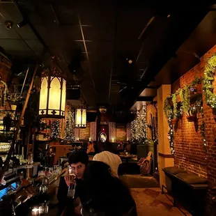 a woman sitting at a bar