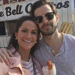 a man and woman posing for a picture