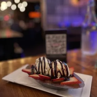 a plate of ice cream sundaes