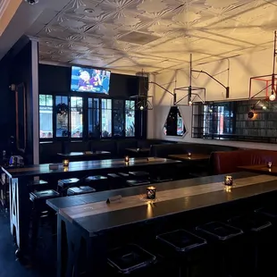 a bar with a television in the background