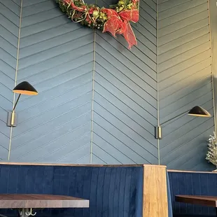 a wreath on the wall of a restaurant
