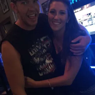 a man and a woman hugging