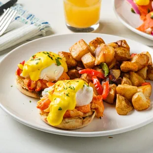 Lobster Benedict: split English muffin served with 6 oz of lobster knuckle and claw sauteed in butter, poached eggs, and hollandaise sauce.