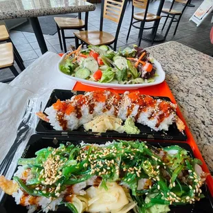 8th Street Roll and The Bento House Roll with side salad - both rolls have shrimp tempura with one having seaweed salad