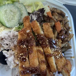 Chicken katsu and teriyaki chicken bento. There was barely any meat mostly batter. Never coming here again so rude!