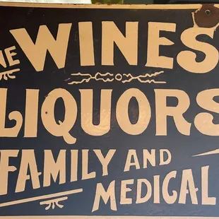 a sign for wine and liquors