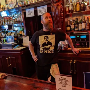 a man standing at the bar