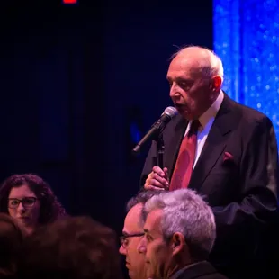 Bill Berman speaking before an event