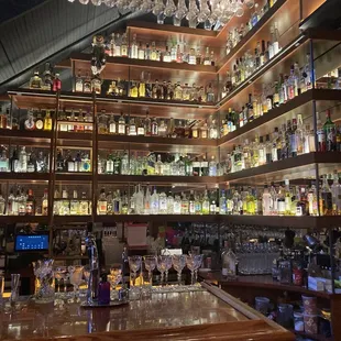 a bar with lots of liquor