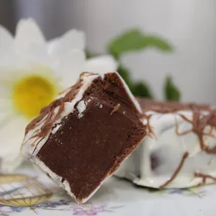 Dark Chocolate fudge covered in white chocolate with a drizzle of dark chocolate.
