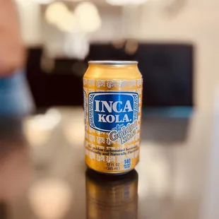 a can of beer on a table