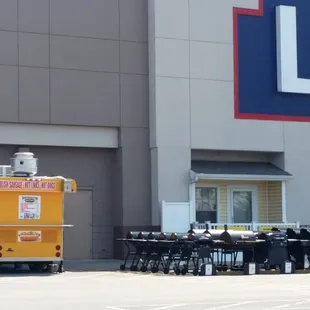 a food truck parked in front of a store