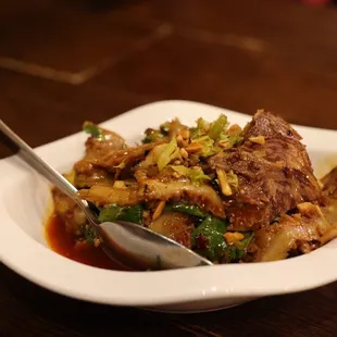 a plate of food with a spoon