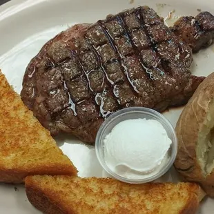 12 ounce ribeye with baked potato and Texas toast.. excellent
