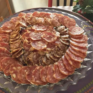 Charlito's cocina truffle seca, Charlito's cocina beer salami seca, Olympic Provisions Sopressata, Olympic Provisions Salchicon.