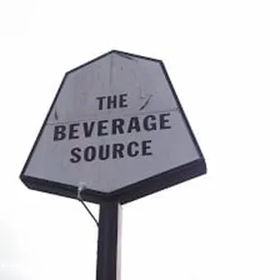 a sign for the beverage source