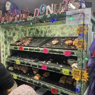 Donuts are displayed on trays
