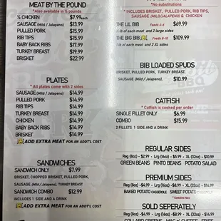 The menu at the counter in front of the cash register.