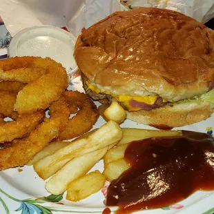 Colossal burger &amp; onion rings/fries