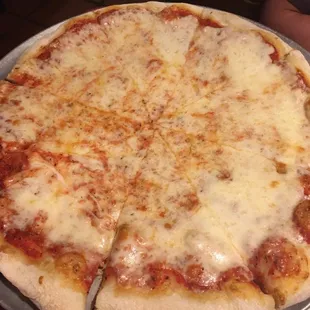 Cheesiest large cheese pizza every! Boyfriend and I left 2 slices.