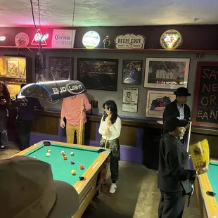 people playing pool