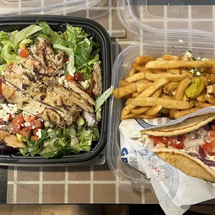 Chicken Greek salad and Big Greek Bifteki Pita with Greek Fries.