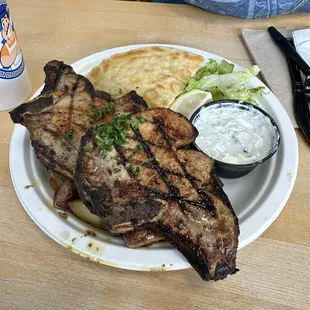Pork Chop entree. Comes with a side Greek salad also. Great value for $12.