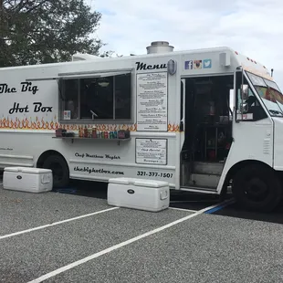 a food truck parked in a parking lot