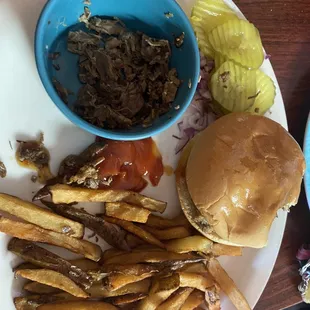 Chopped beef sandwich with fries