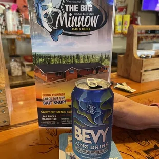 a can of beer on a table