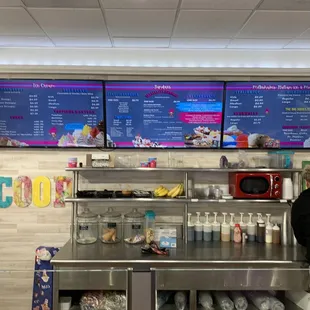 a man standing in front of a counter