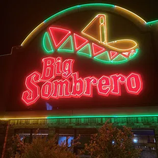 a neon sign for a mexican restaurant