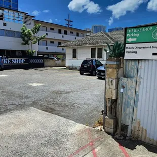 Where the parking is. The back door is where the entrance is too.
