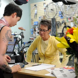 Rose ringing up a customer at the Grand Opening.