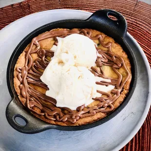 Giant cookie with a scoop of ice cream.